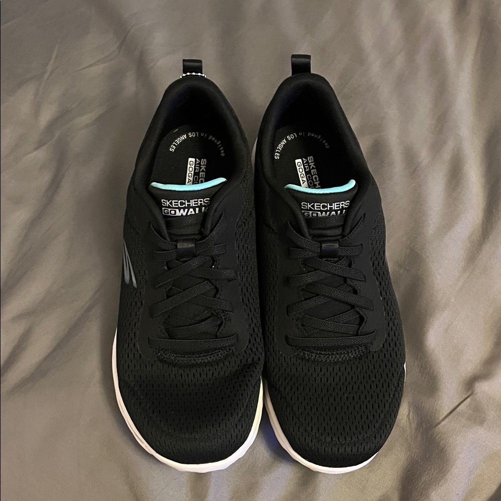 Skechers Women's Black Athletic Shoes with White Sole